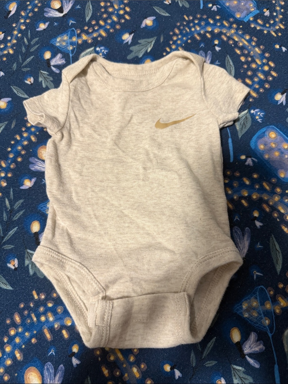 Nike Cream Baby One-Piece Bodysuit with Gold Swoosh